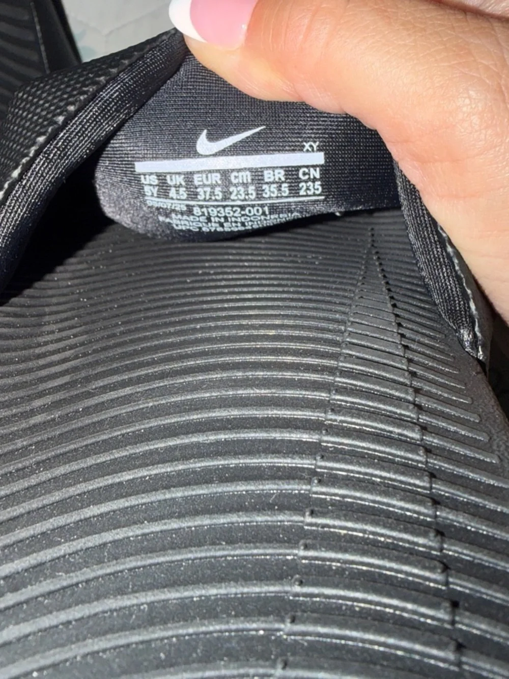 Nike Black Slides with White Swoosh Strap